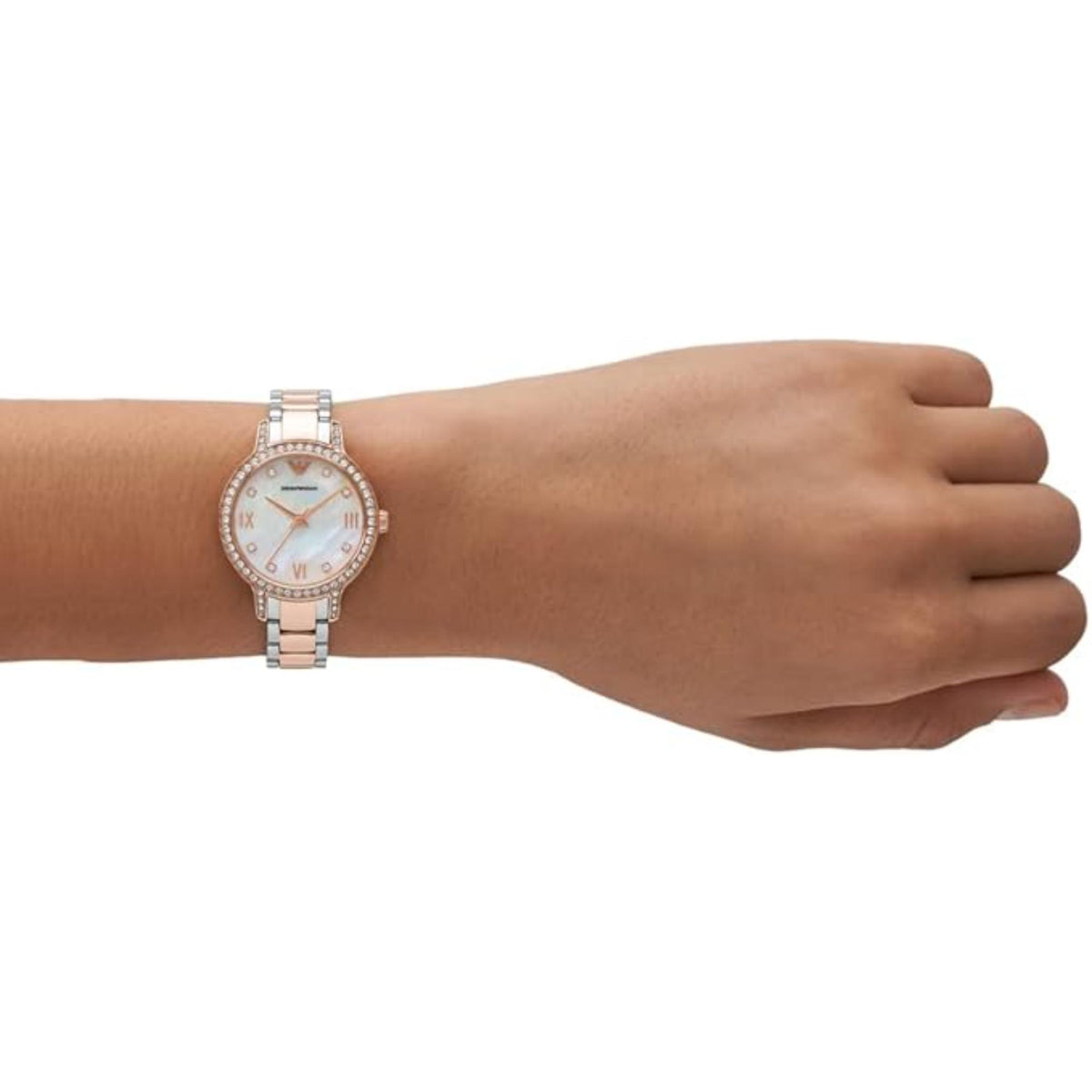 Emporio Armani Cleo watch on wrist, white dial with Roman numerals and two-tone metal band