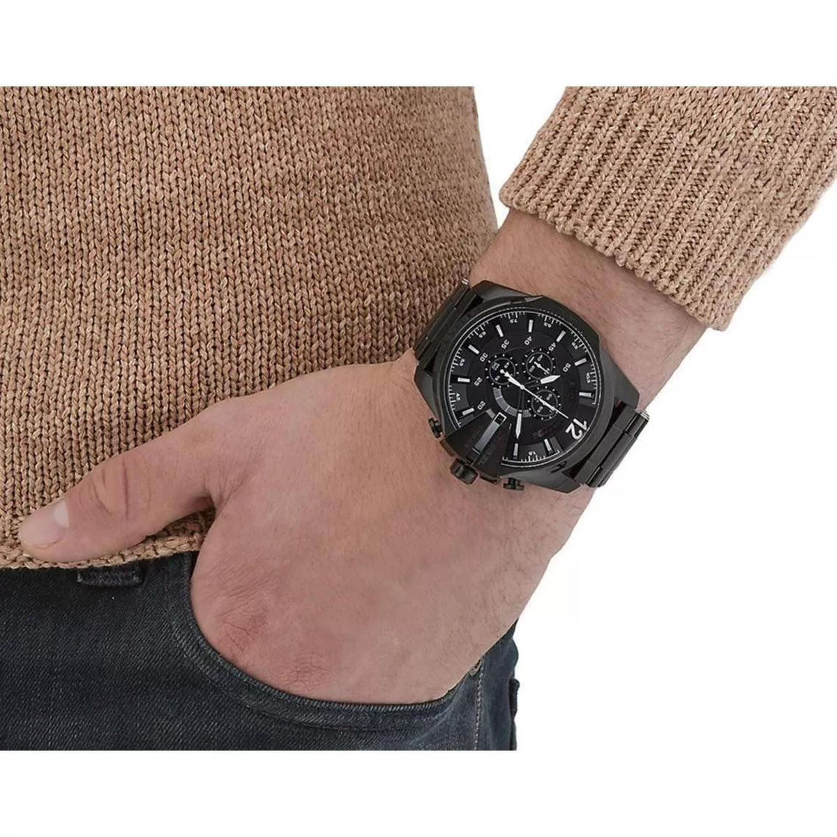 Diesel Mega Chief chronograph watch on wrist with black dial and black steel bracelet.