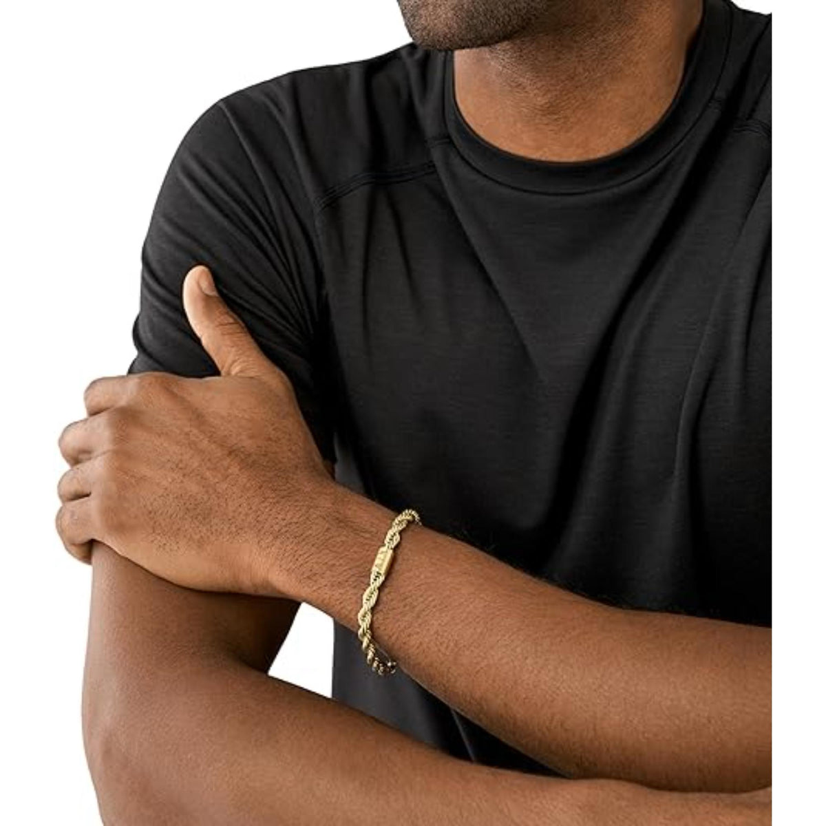 Gold-tone chain bracelet worn on wrist with A|X logo links