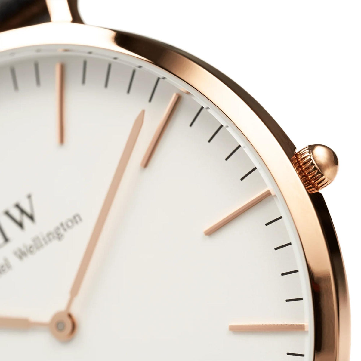 Rose gold case wristwatch with white dial and brown leather strap, slim markers