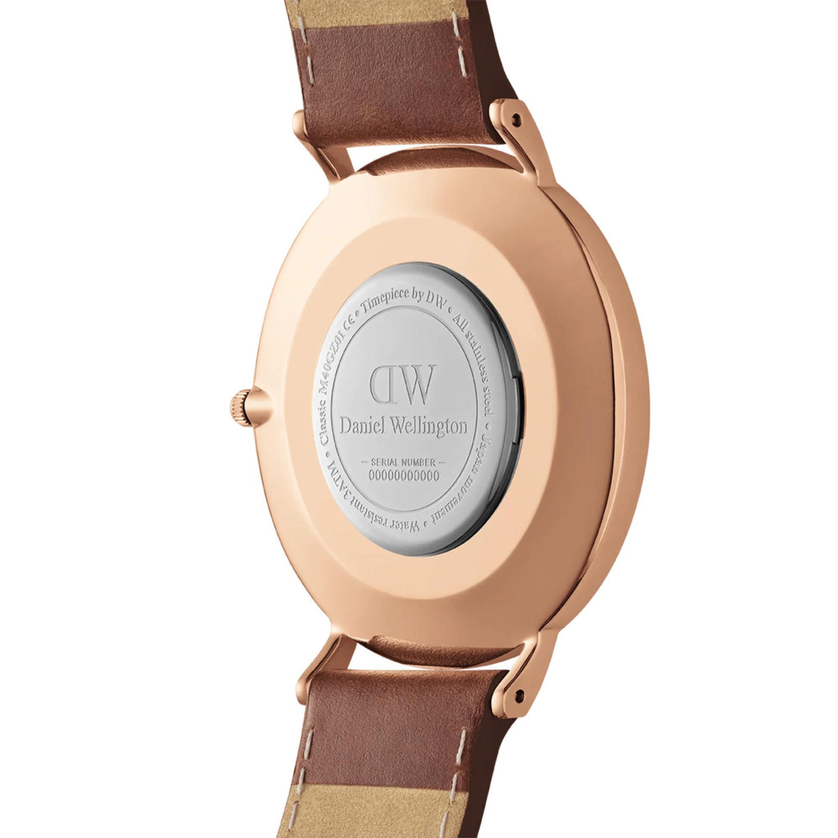 Rose-gold caseback of the watch with engraving and brown leather strap