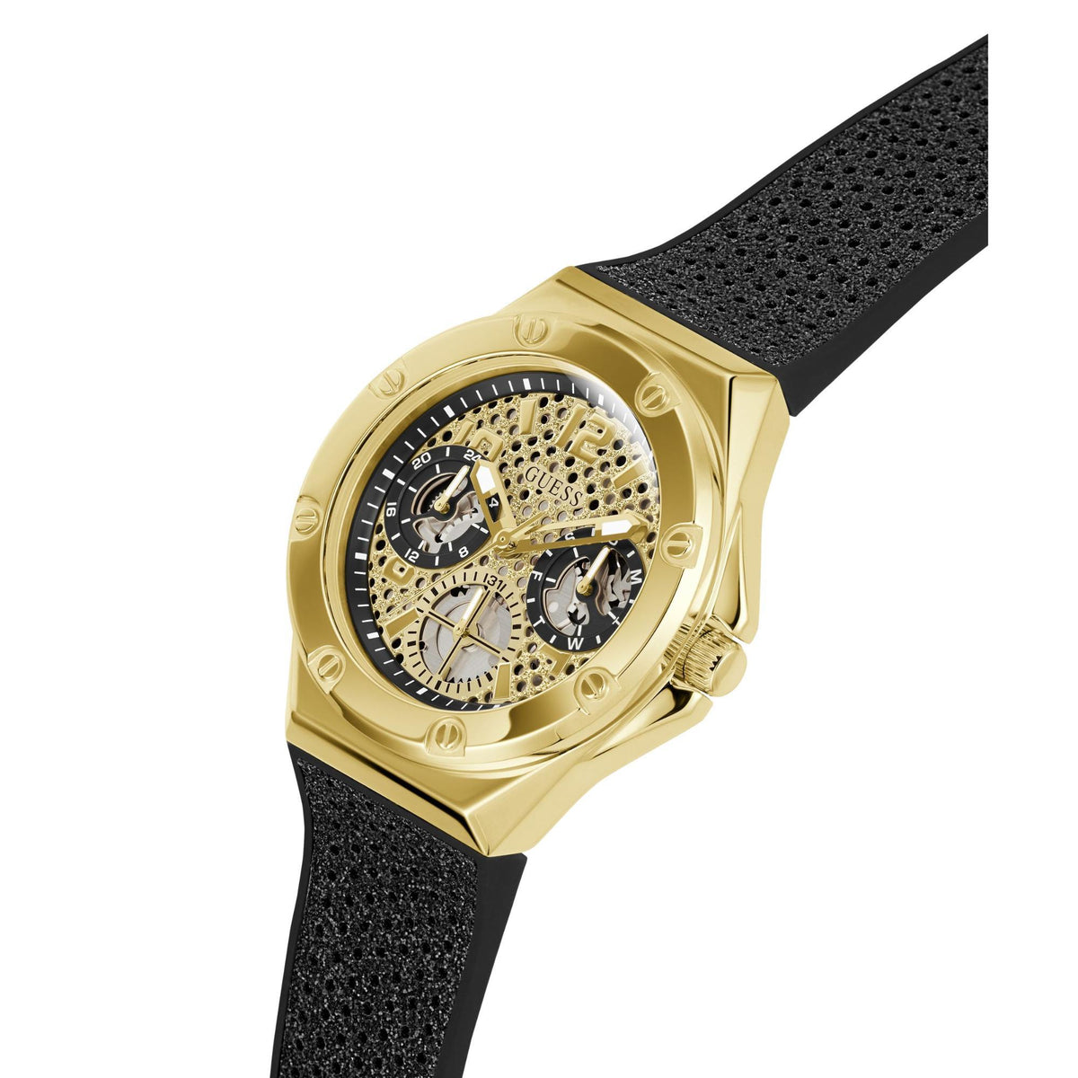 Gold-tone watch face on black silicone strap, showing crystal dial and subdials