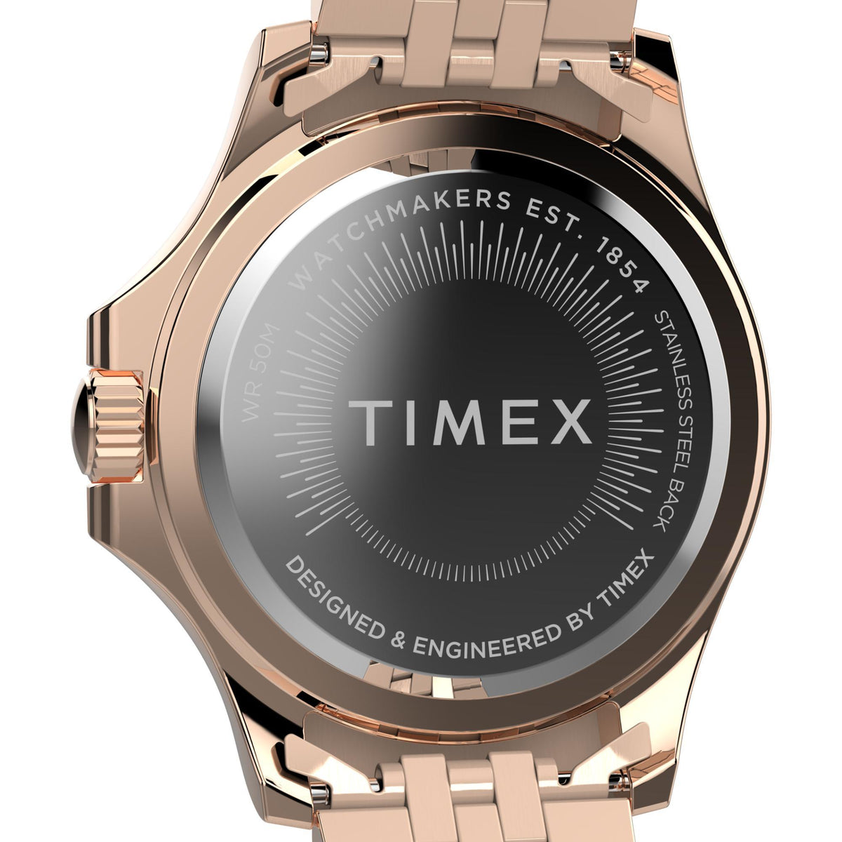 Rose gold watch case back with TIMEX branding and patterned text ring