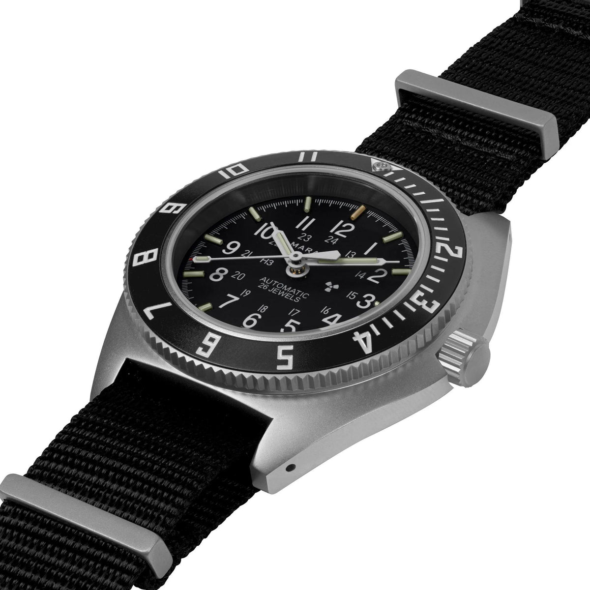 Stainless steel sports watch with black dial, black bezel, and black nylon strap.