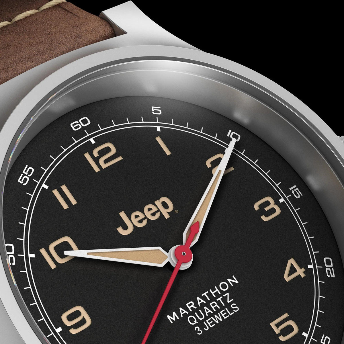 Close-up of black Jeep dial with Marathon Quartz branding and red-accent seconds hand.