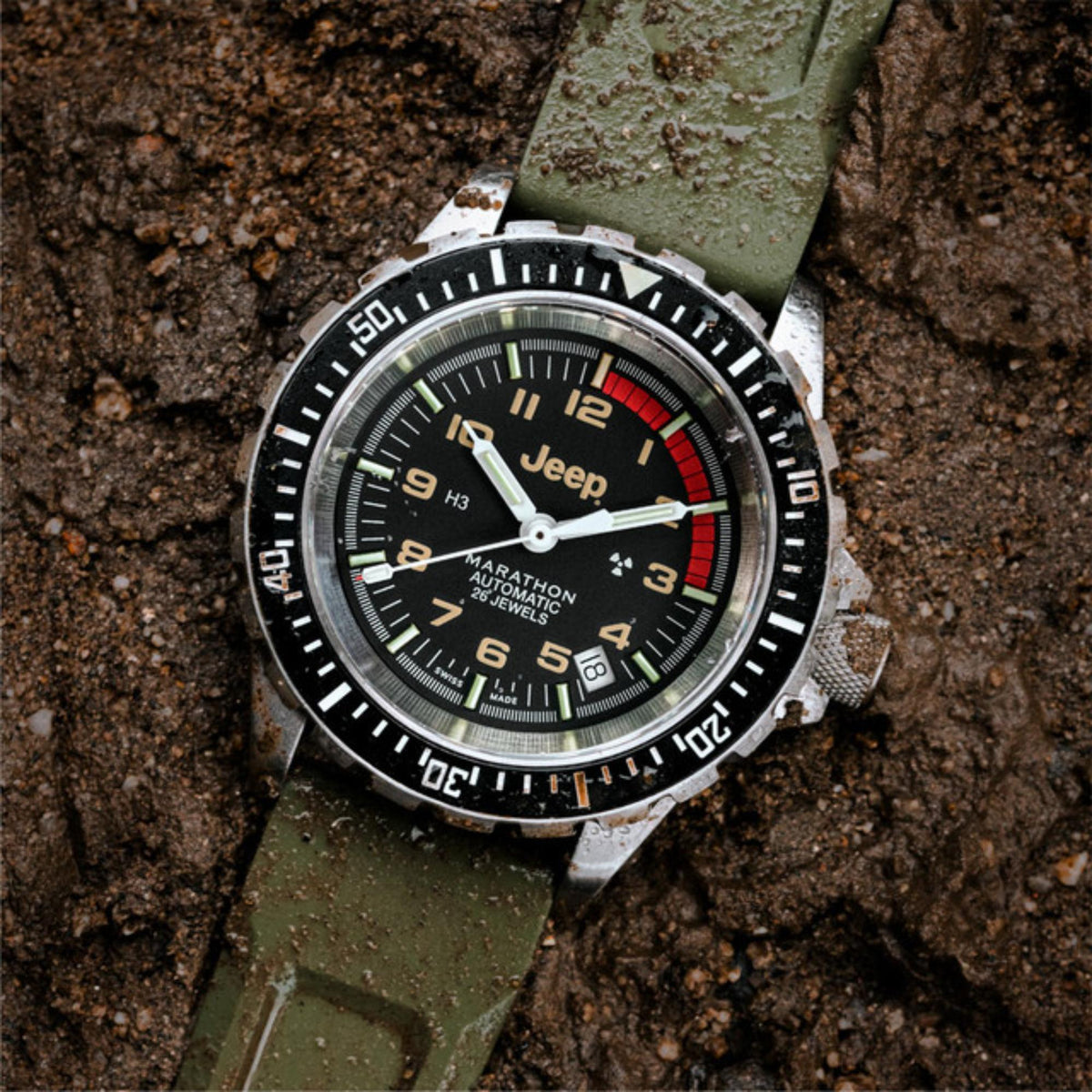 Men's stainless steel diver watch on olive strap with black dial and red seconds hand