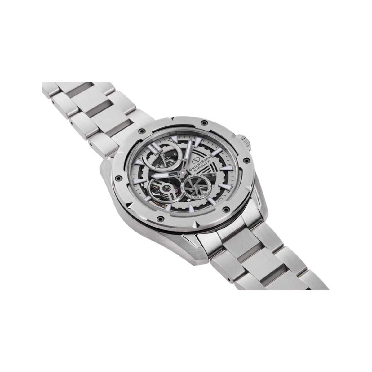 Silver steel automatic skeleton watch with openwork dial, angled view, metal link bracelet