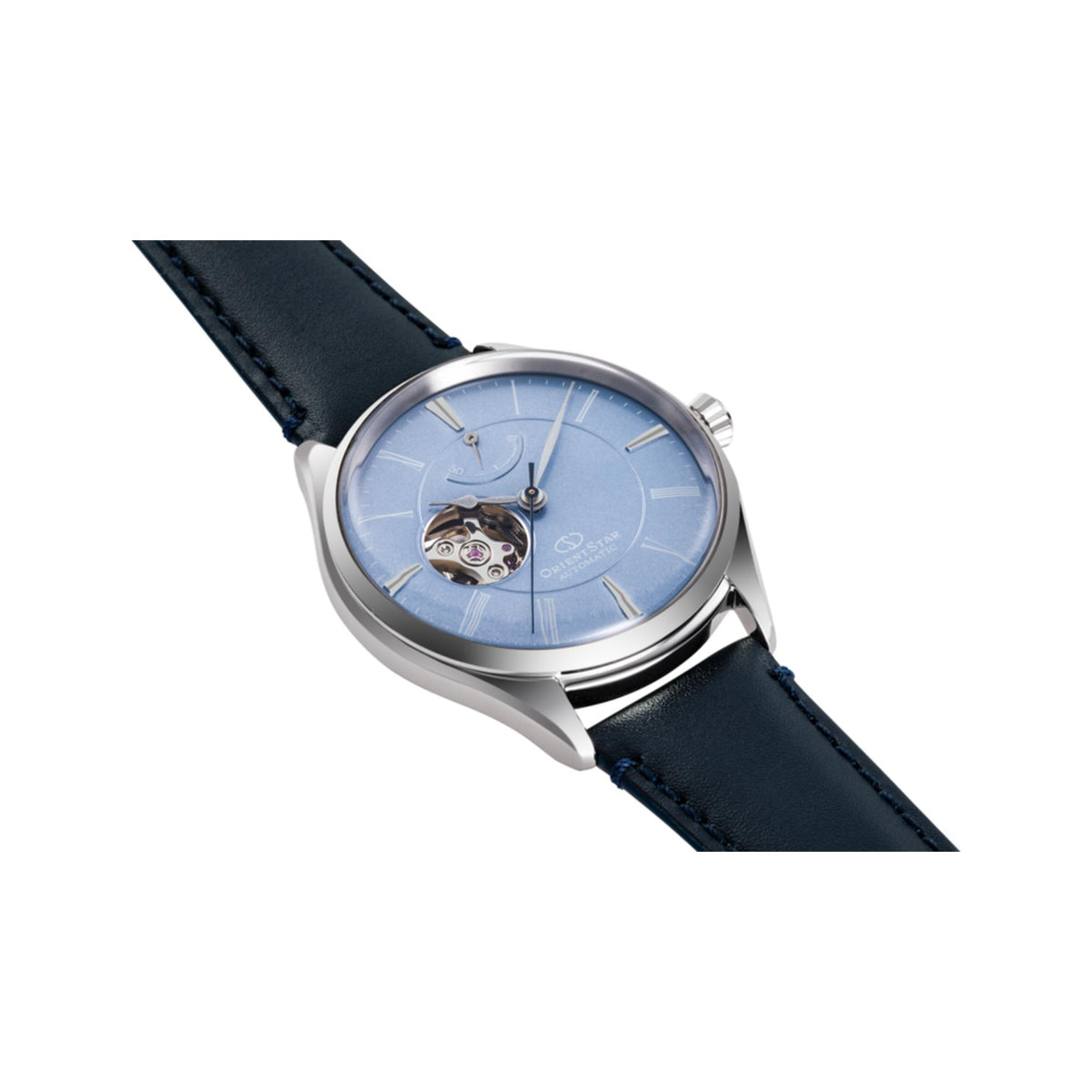Mens automatic watch with blue dial and visible movement, navy leather strap, stainless case