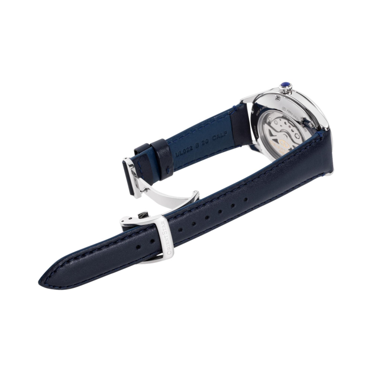 Mens automatic watch with navy leather strap and silver caseback showing movement