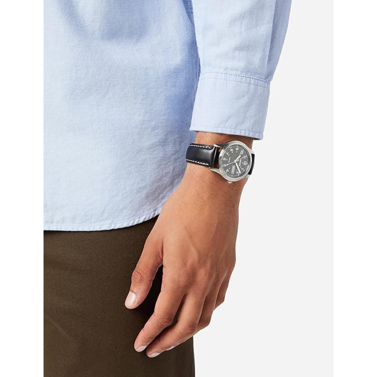 Men's Lorus analog quartz watch on wrist with black dial and black leather strap