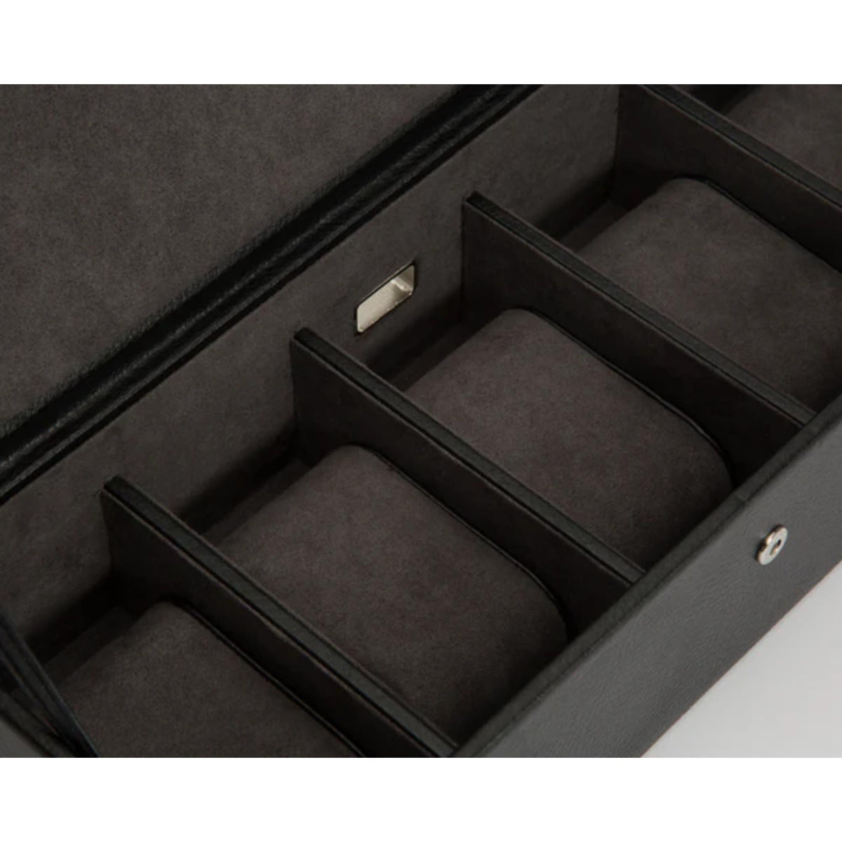 Open dark gray watch box interior with five padded slots and metal latch