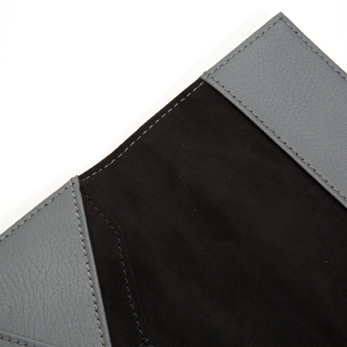 WOLF Howard passport holder detail, gray leather with black inner panel and contrast stitching