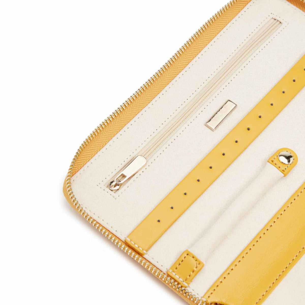 Beige jewelry portfolio interior with slip slots, snap loops, and strap attachment points