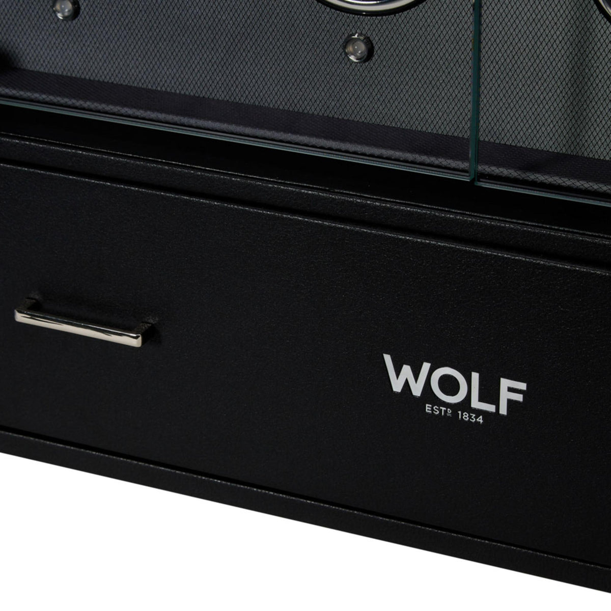 Close-up of black watch winder drawer with WOLF logo and silver handle
