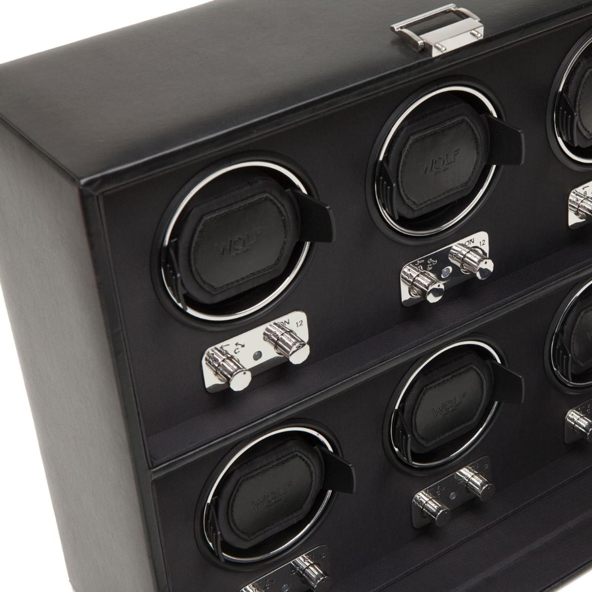 Black watch winder corner with two circular winding cups and chrome control buttons