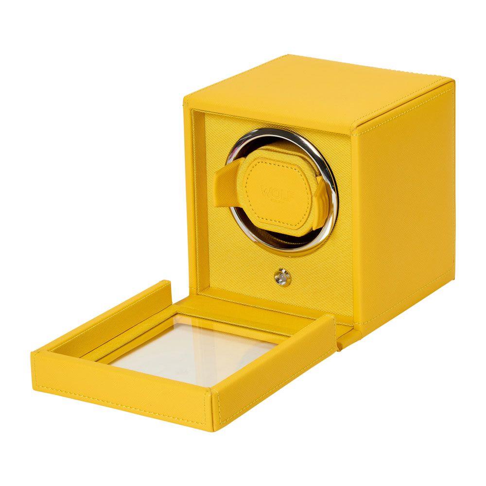 Vibrant yellow watch winder with open base tray and glass front window