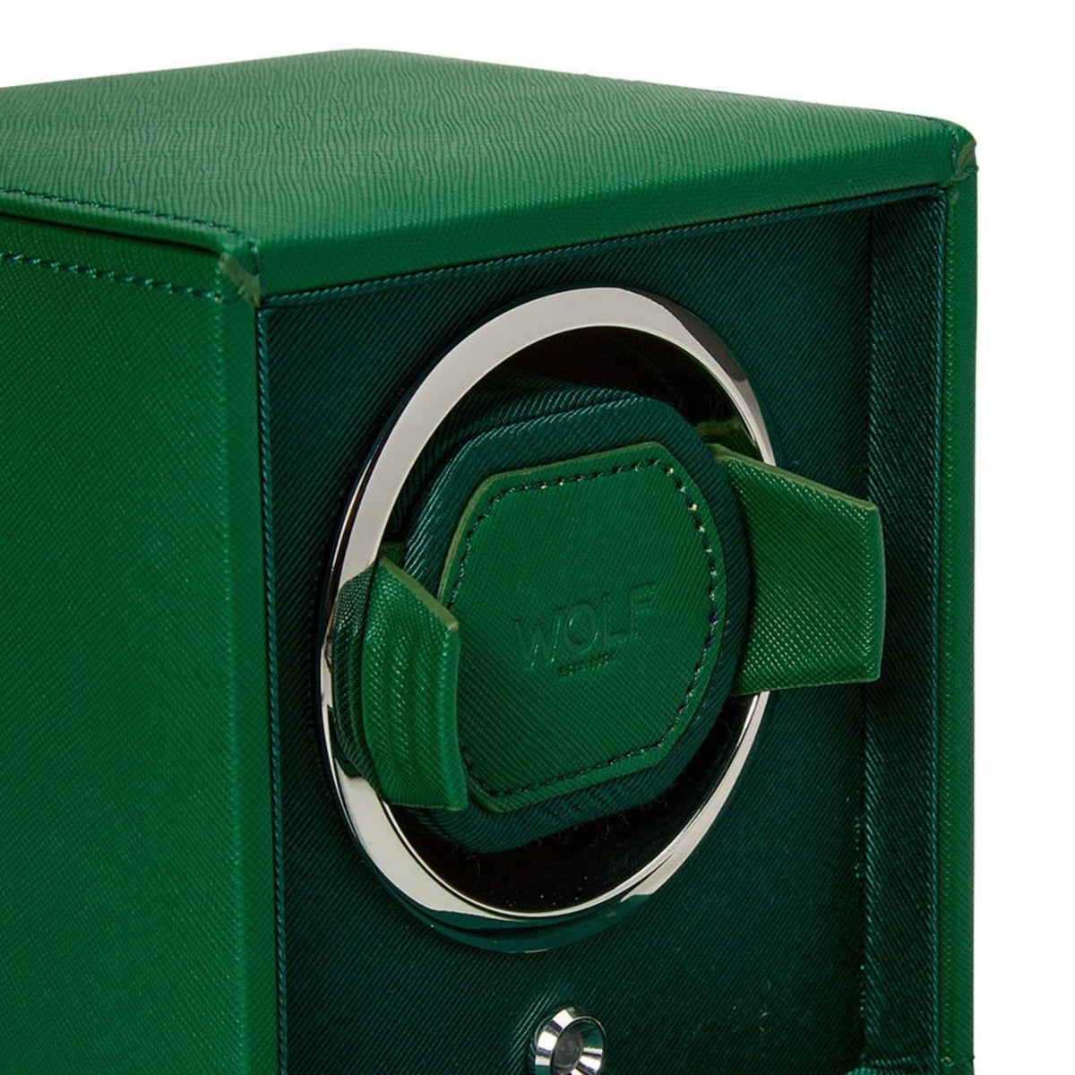 WOLF watch winder, close-up of green watch cushion inside vibrant green front window