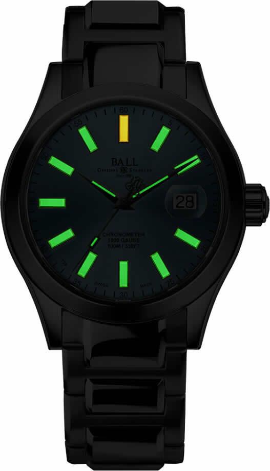 Black rubber men’s chronometer watch with green luminous markers and date window at 28
