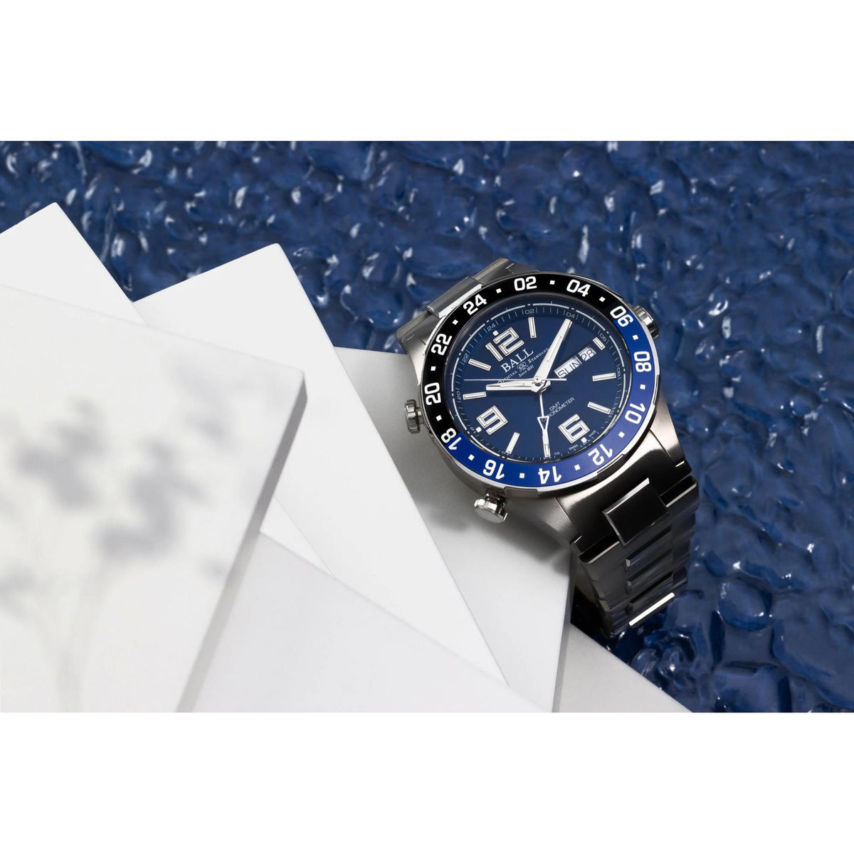 Men's stainless steel watch with blue dial and black link bracelet