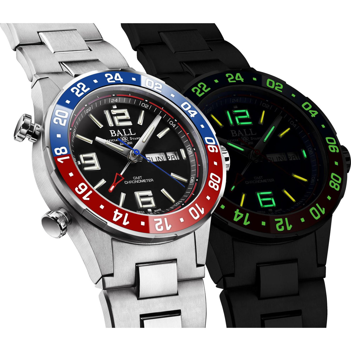 Pair of diver watches: silver model with blue/red bezel and black model with green glow