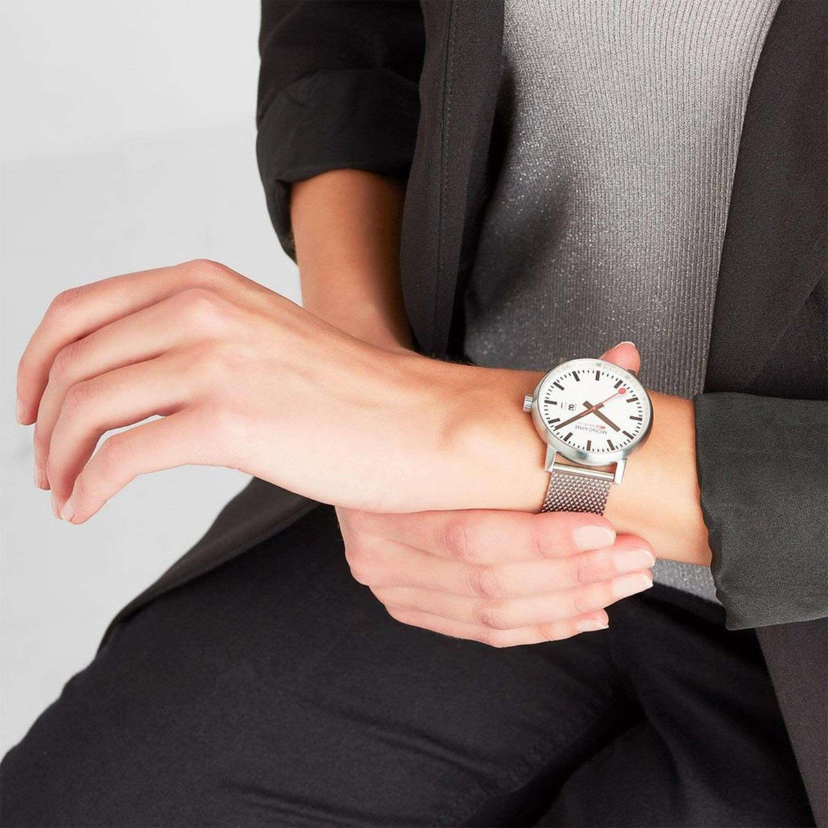 Mondaine Evo2 MSE.40210.SM Swiss Railways wristwatch styled on wrist in formal attire