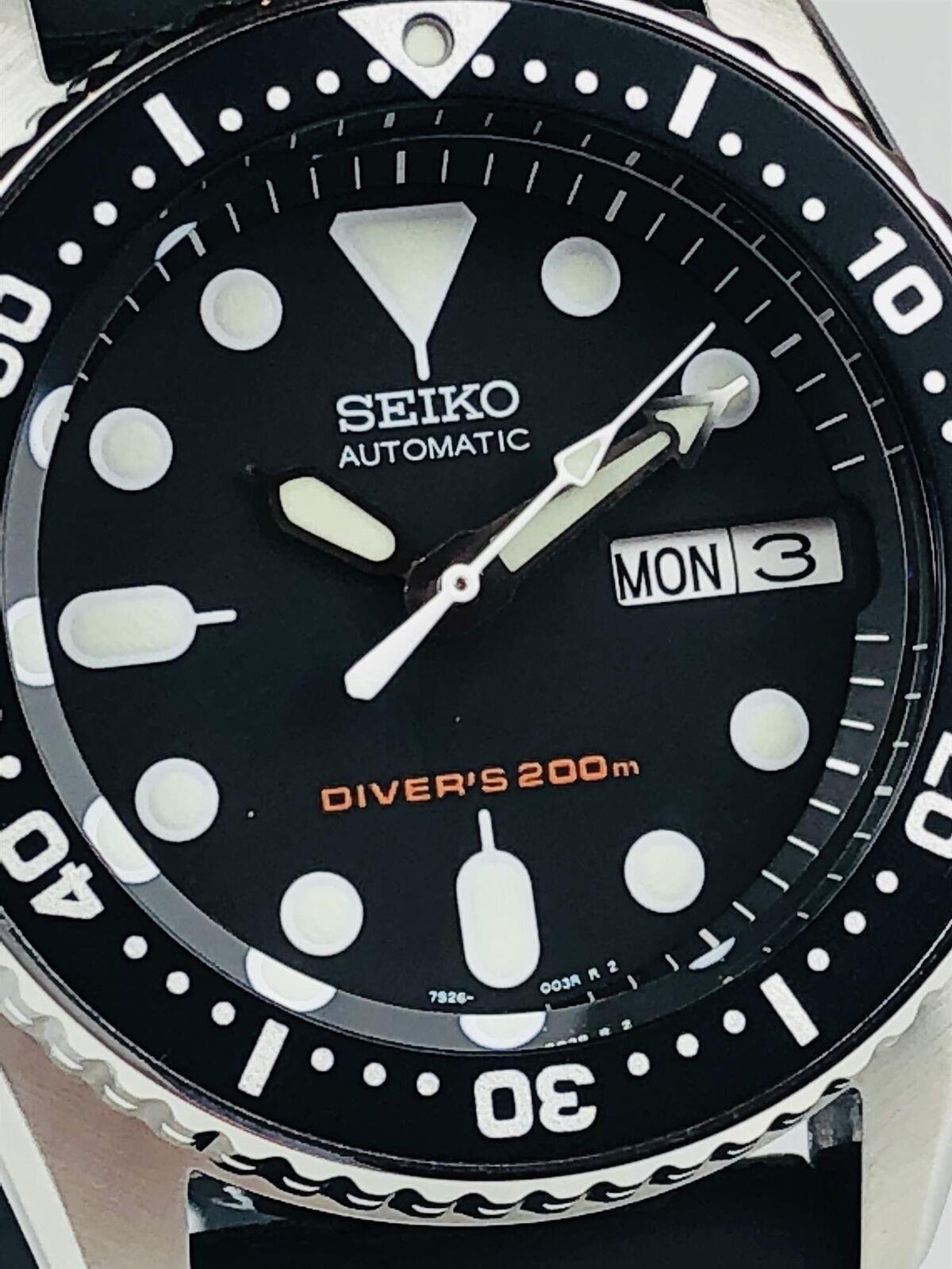Seiko Diver's Automatic SKX013K1 black dial and luminous markers close up