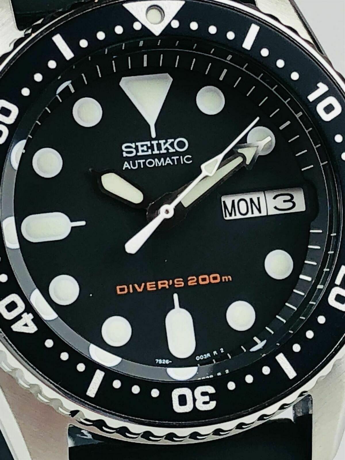 Seiko Divers SKX013K1 automatic black dial watch dial close up