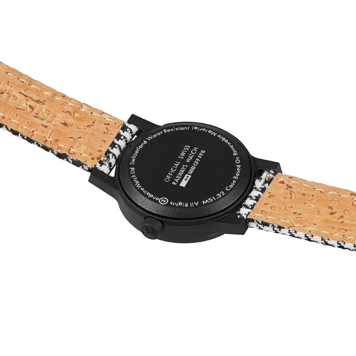Quartz wristwatch back with black case and houndstooth strap, water-resistant text visible