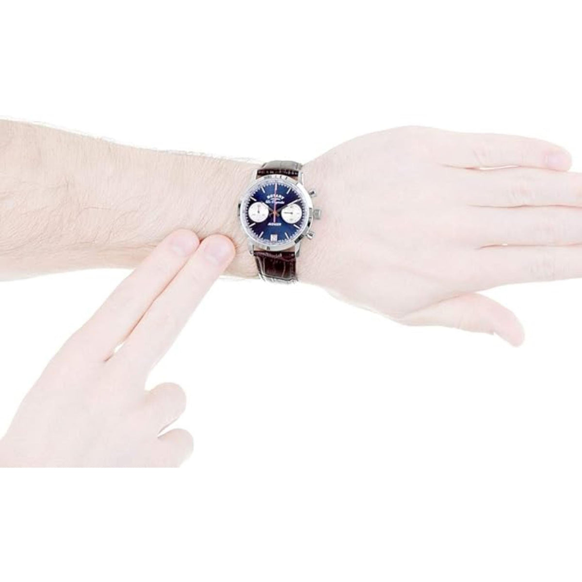 Men's wristwatch on wrist, silver case and blue dial, brown leather strap fastened