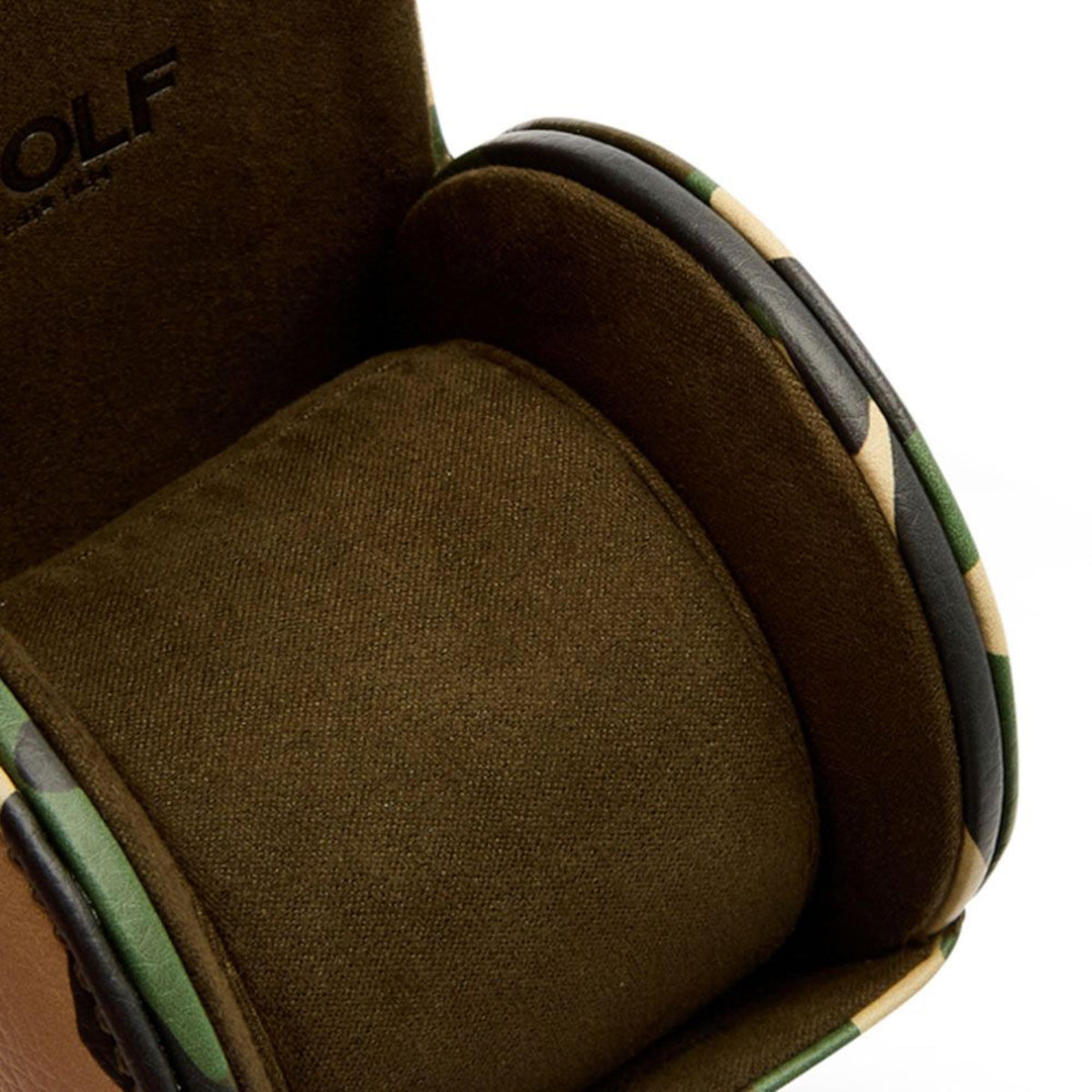 Open watch roll interior with brown suede lining and camo trim