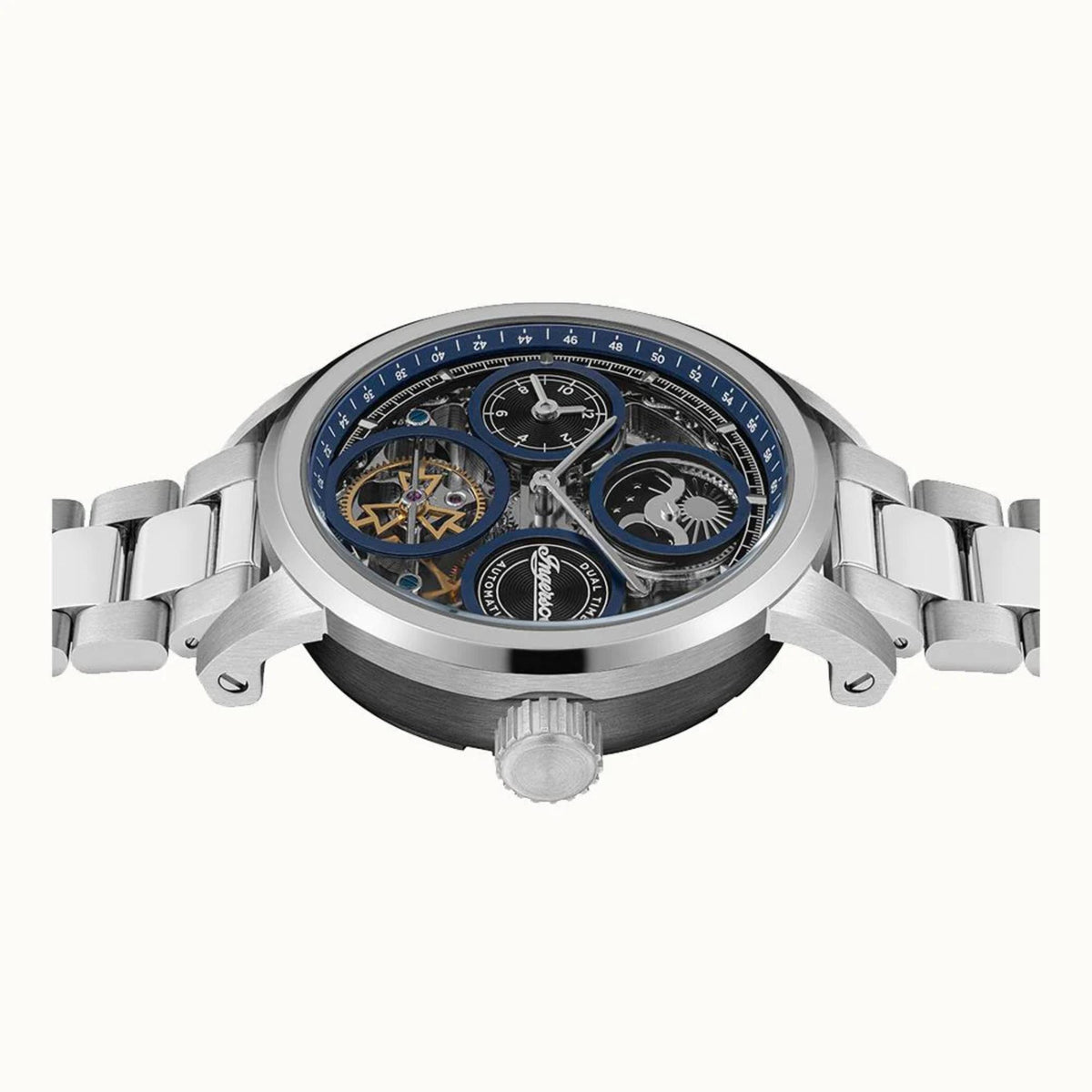 Men's automatic watch close front view, blue skeleton dial, steel bracelet and crown