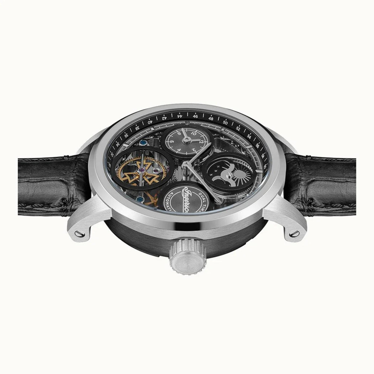 Men’s skeleton watch with black leather strap and round silver case, visible crown