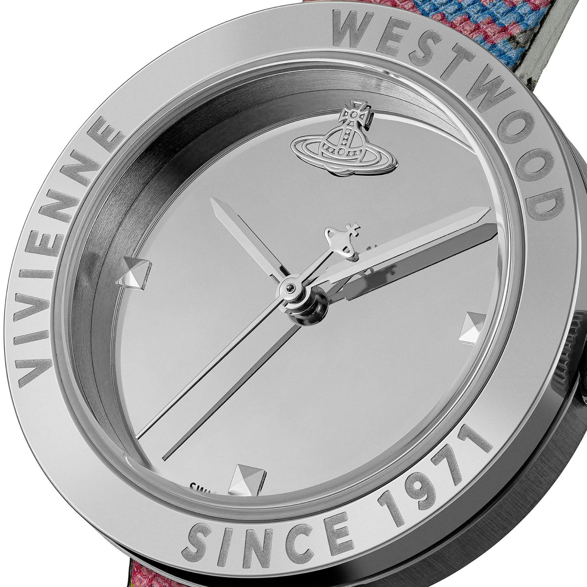 Vivienne Westwood Rebel VV303SLMT close-up view of silver dial with engraved bezel and orb motif