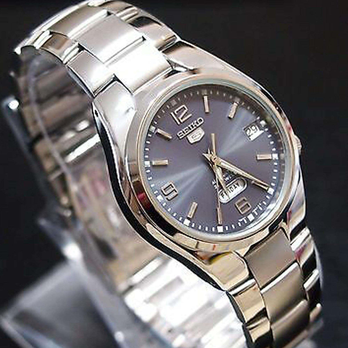 Stainless steel automatic watch with grey dial and day-date window, metal bracelet