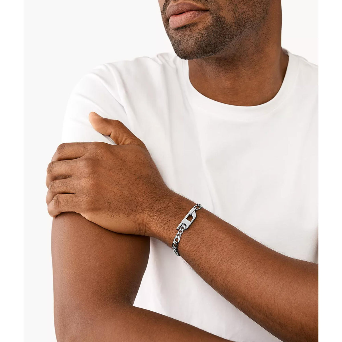 Stainless steel chain bracelet worn on man's wrist with secure clasp