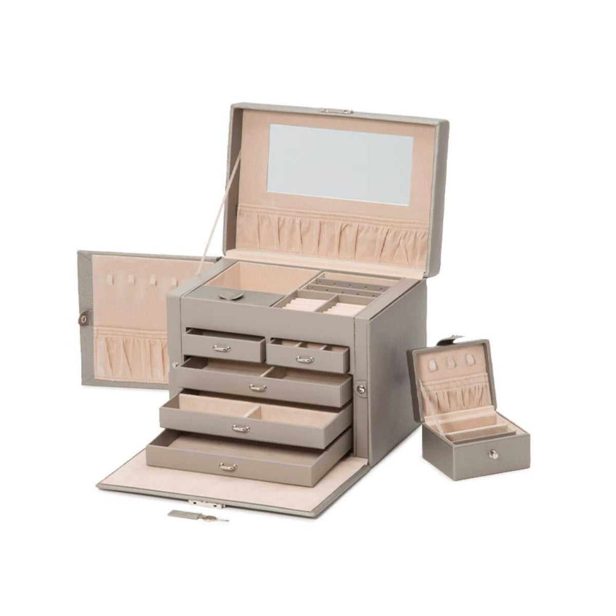 Tan jewelry box open with stacked drawers and cushioned compartments for jewelry