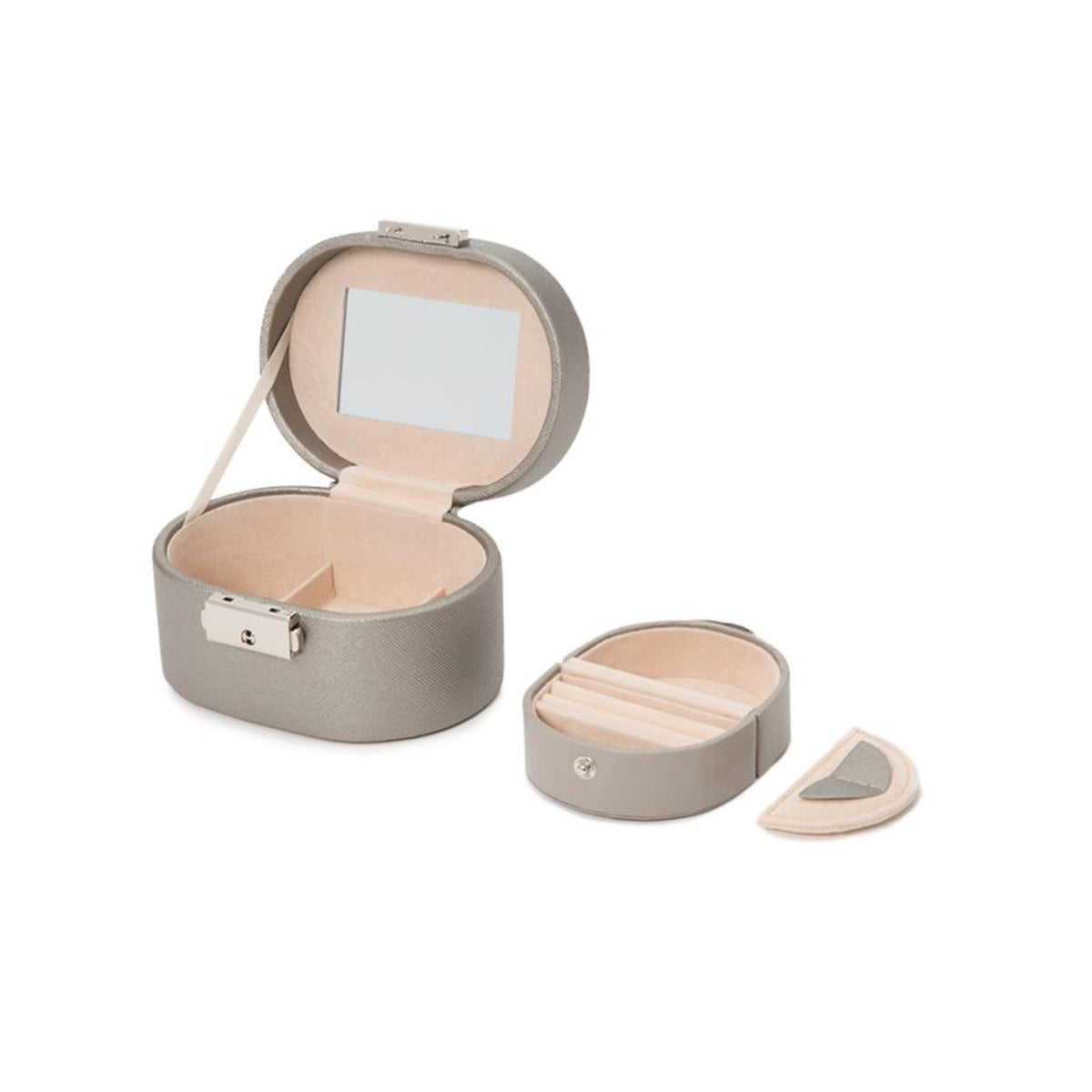 WOLF oval jewelry box opened with tan interior compartments and small accessory pieces