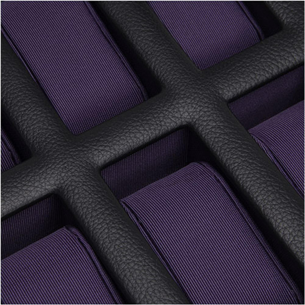 WOLF watch box interior with purple ridged fabric slots on black textured padding