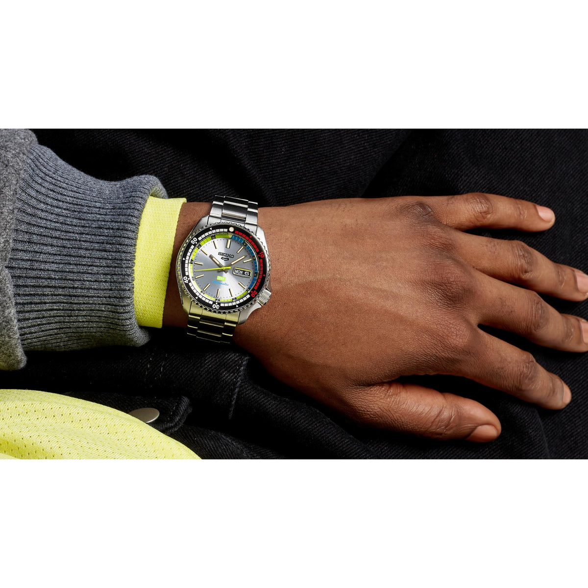 Seiko 5 Sports x HUF SRPL33K1 silver dial wrist shot view