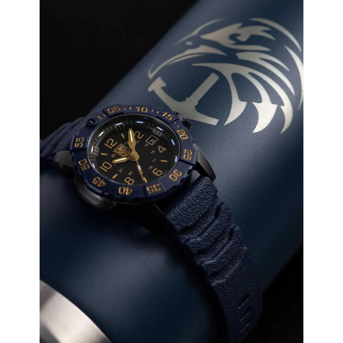 Navy Seal men's quartz watch with dark blue rubber strap and black dial, angled view.