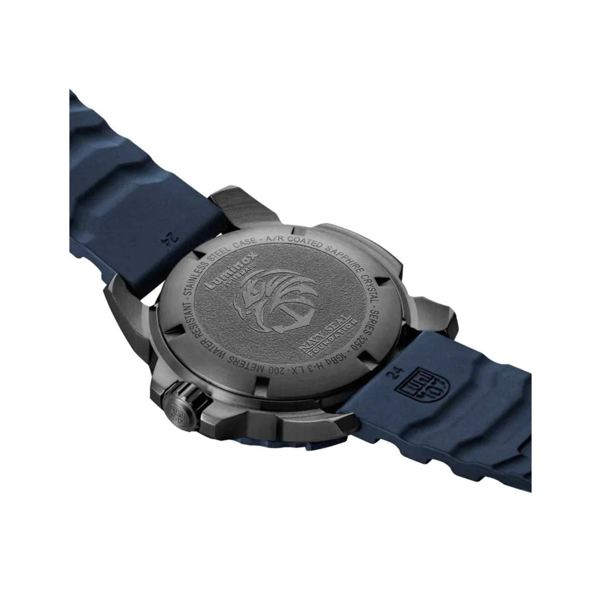 Navy Seal men's quartz watch caseback on blue rubber strap with engraved emblem.
