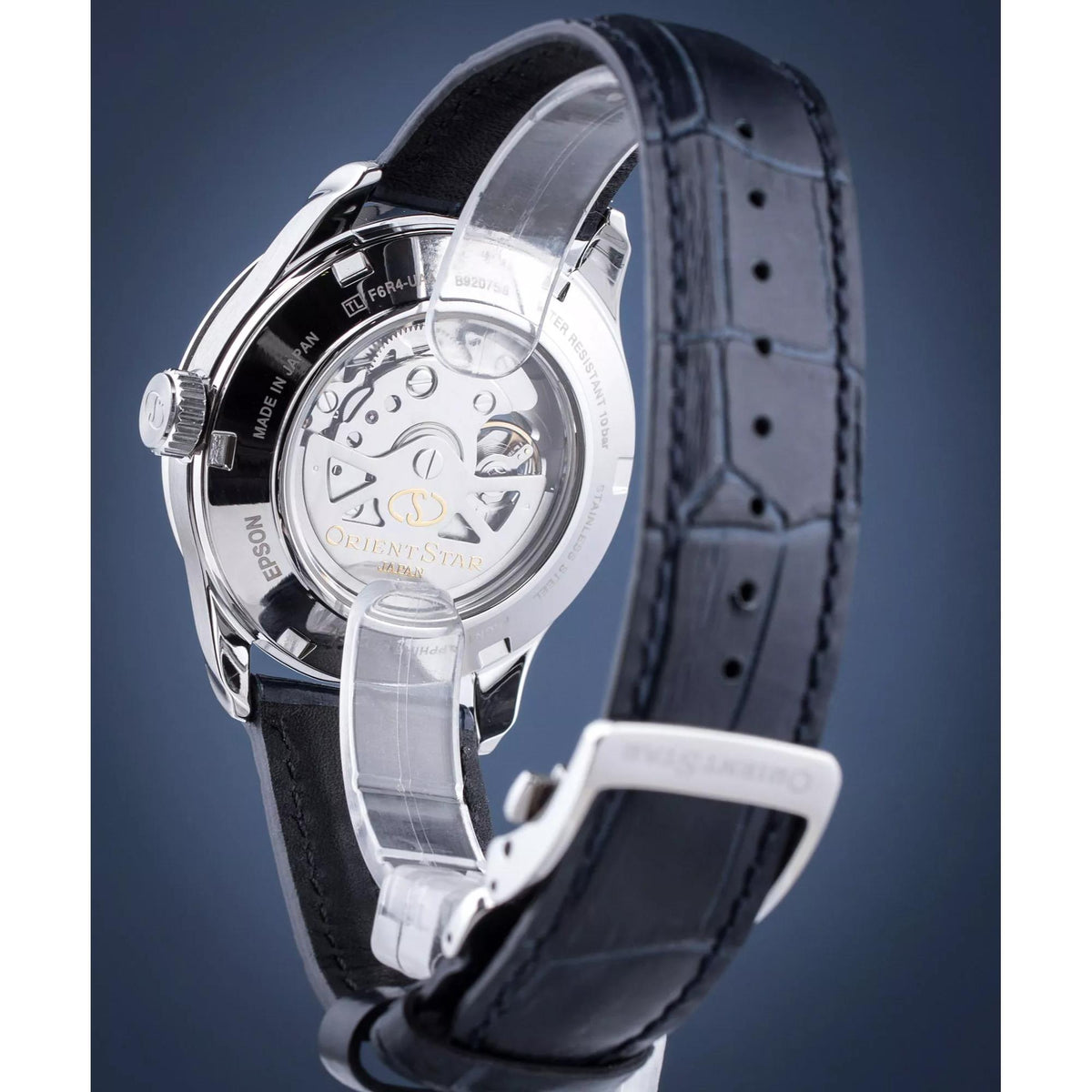 Semi-skeleton automatic watch with visible movement and black leather strap