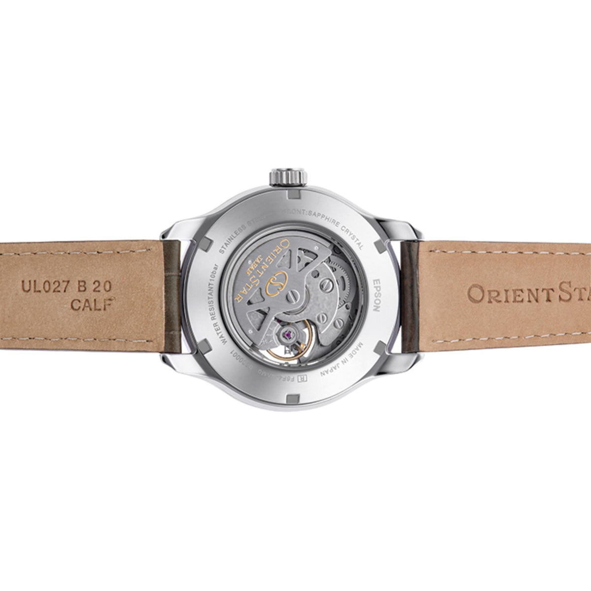 Automatic watch caseback with visible movement and brown leather strap