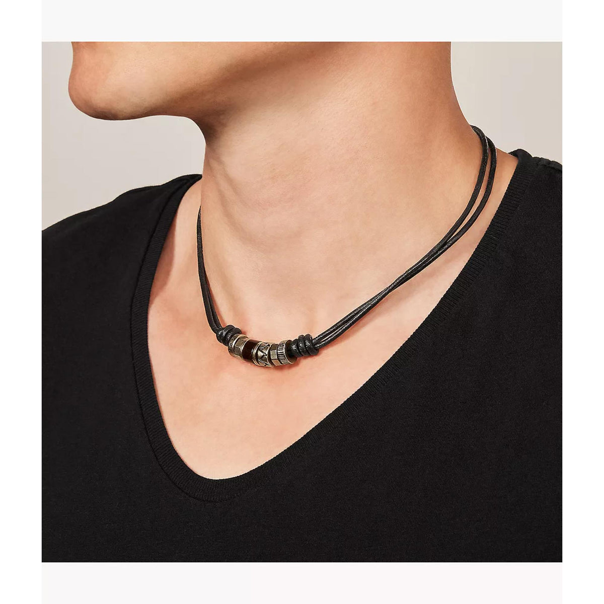 Men's black cord necklace on model's neck with silver-tone and brown bead segments