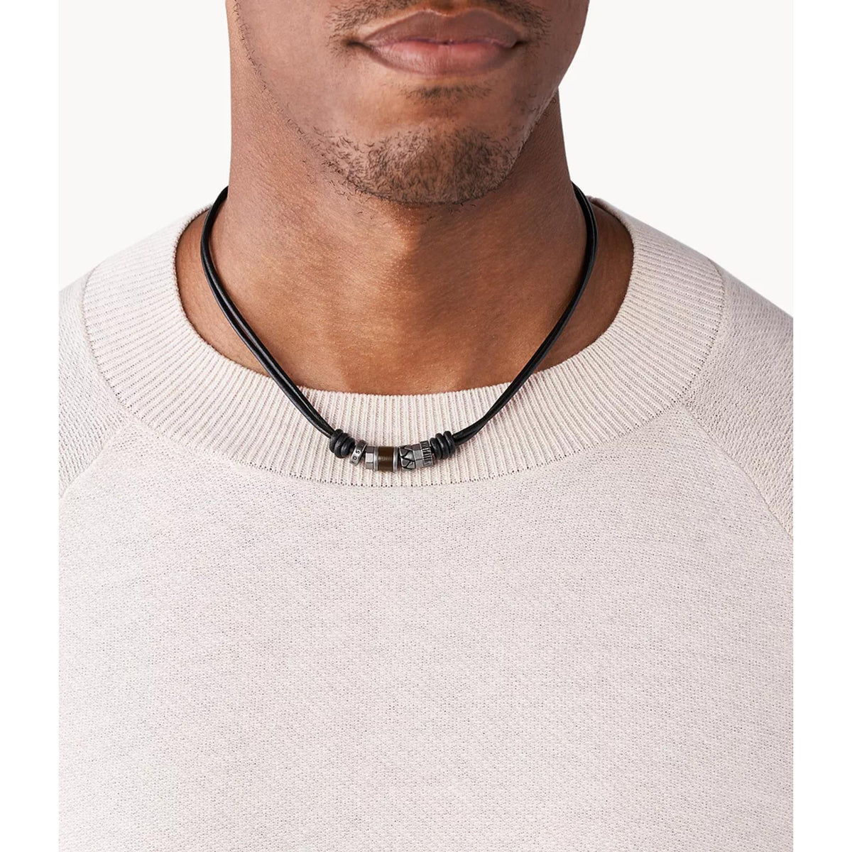 Men's black cord necklace on model's neck with silver-tone and brown center beads