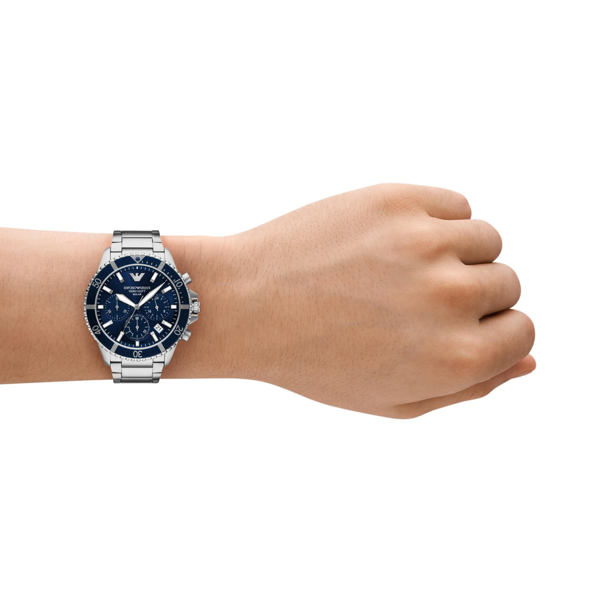 Emporio Armani World Explorer AR11681 timepiece shown on a wrist highlighting the blue dial and steel bracelet