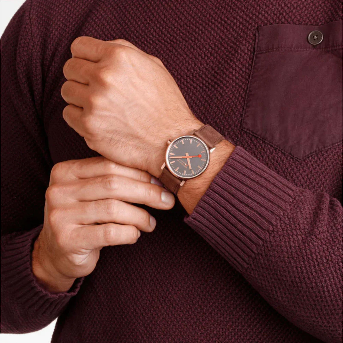Mondaine Evo2 MSE.40181.LG lifestyle wrist shot featuring grey dial watch with textured sleeve detail
