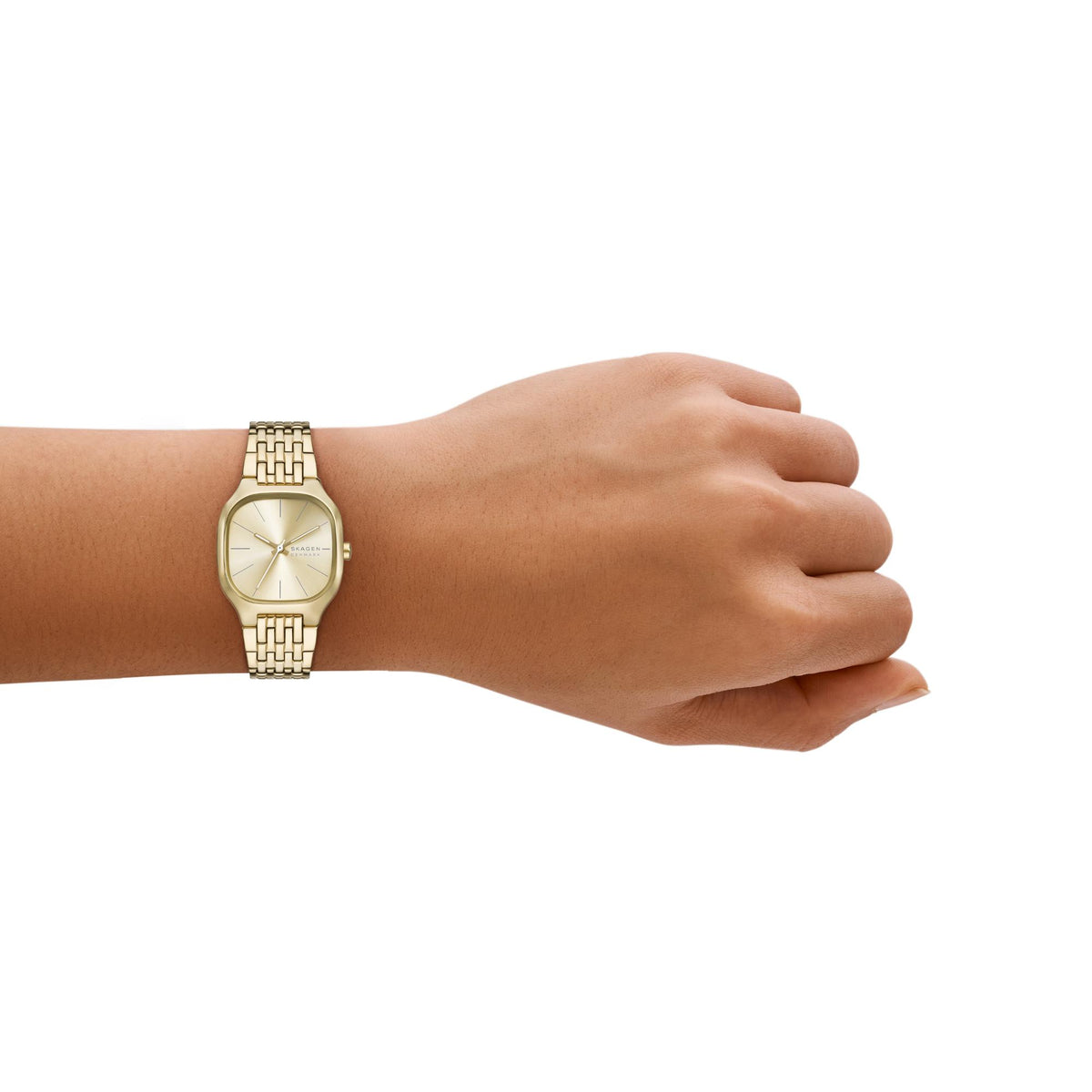 Gold-tone ladies wristwatch on a hand with linked bracelet strap