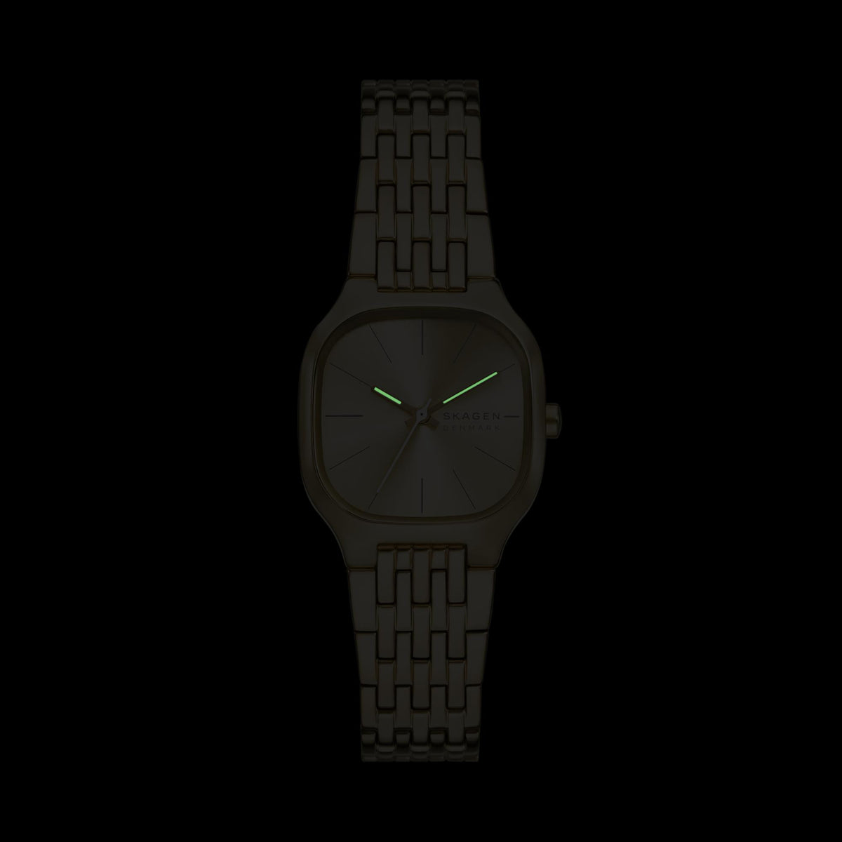 Gold-tone ladies wristwatch with dark dial and green hand accents