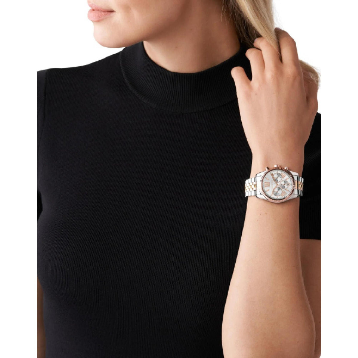 Michael Kors Lexington MK5735 womens watch worn on a wrist showing the silver dial chronograph layout and tri-tone bracelet